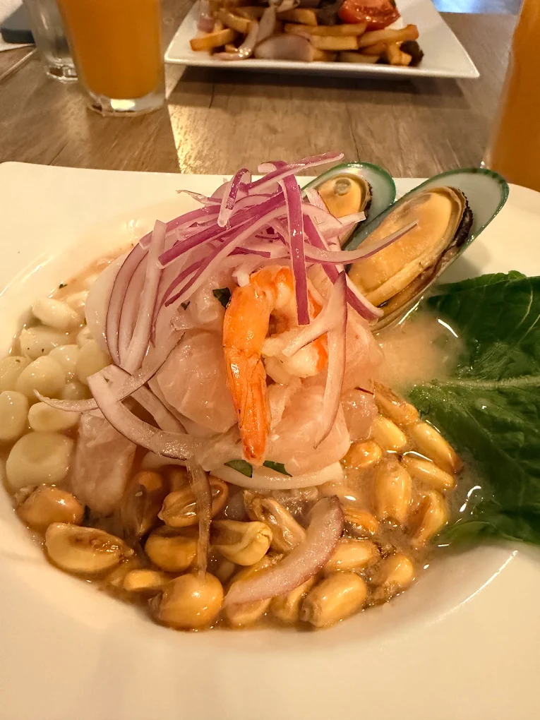 Ceviche bowl with shrimp, mussels, red onion and Peruvian corn at La Crema